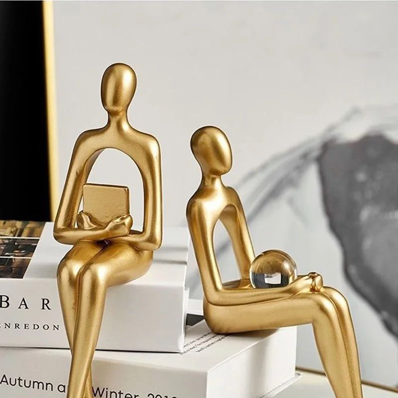 Gold Thinker Statues